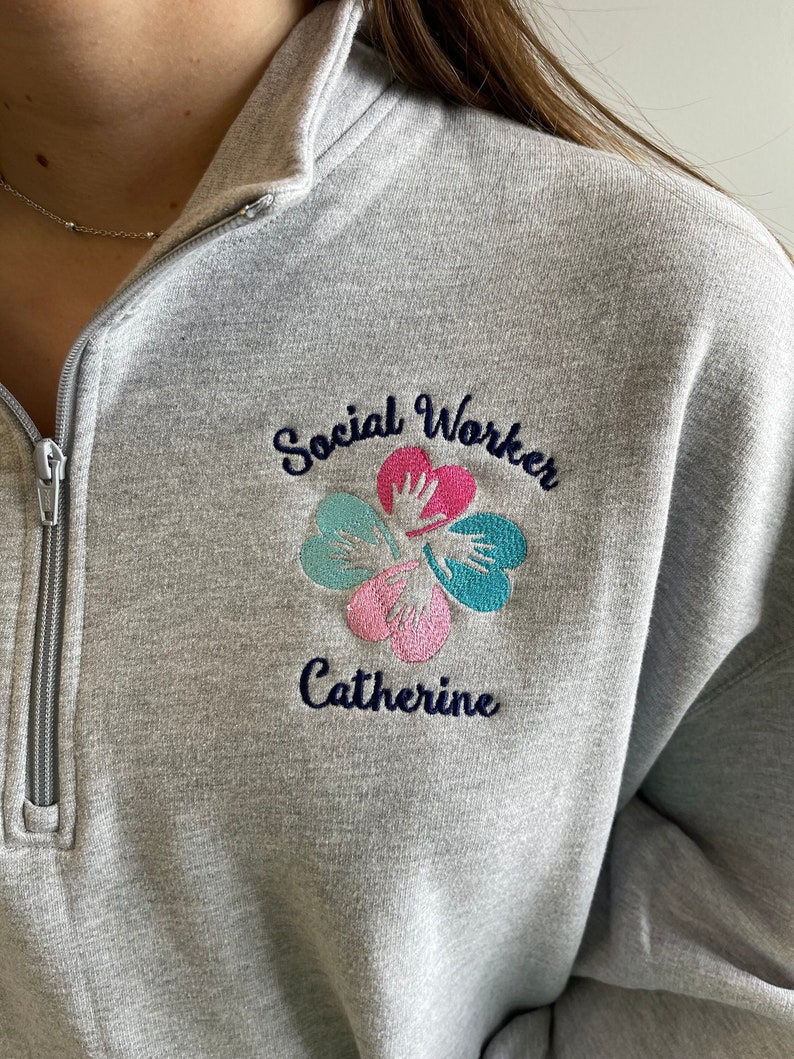 social worker hands, custom personalized embroidery design, pullover quarter zip sweatshirt or full zip jacket with zippered pockets, hidden thumbholes, hooded hoodie, gray, black, royal blue, navy, teal, turquoise, pink, raspberry, coral, white, red