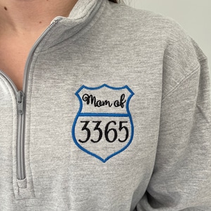 police mom design, custom personalized embroidery design, pullover quarter zip sweatshirt or full zip jacket with zippered pockets, hidden thumbholes, hooded hoodie, gray, black, royal blue, navy, teal, turquoise, pink, raspberry, coral, white, red