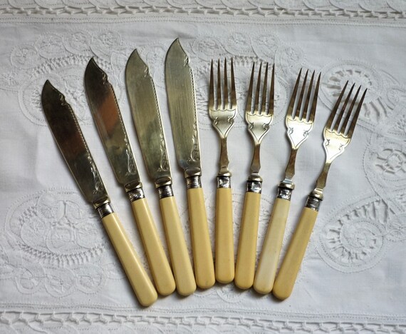 fish knives and forks antique