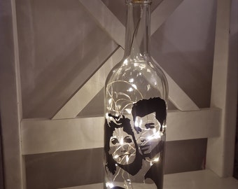 John Travolta y Olivia Newton John Grease Light Bottle