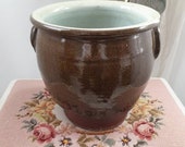 Gorgeously large antique French confit pot in dark brown with duck egg blue glazed interior.