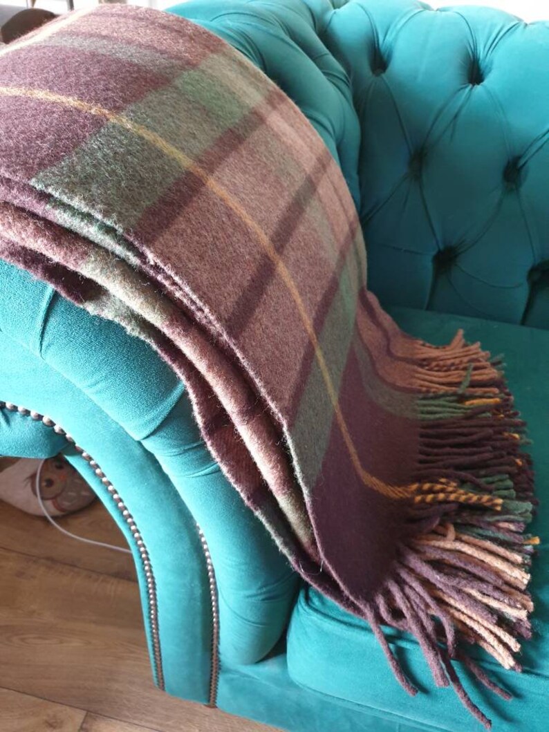 A large Scottish woollen blanket in a brown and green check. Etsy