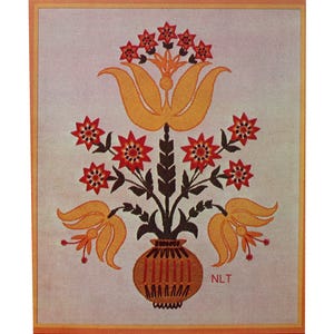May include: A rectangular textile wall hanging featuring an embroidered floral arrangement in a vase. The design includes yellow and red flowers with dark brown stems on a light background. The letters NLT are stitched in red near the vase.