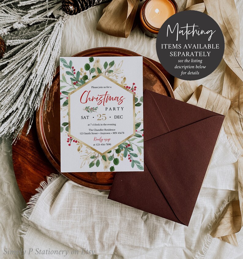 May include: A festive Christmas party invitation featuring a gold geometric design with red berries and green foliage. The invitation, with event details, is on a white background. A dark red envelope is placed beside it. The text reads "Christmas Party".