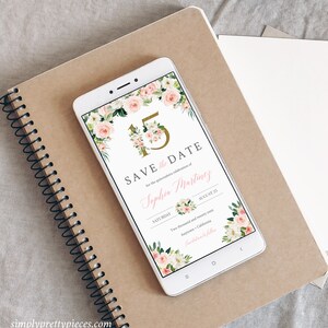 May include: A digital save the date card with pink and white flowers and gold lettering. The text reads "Save the Date for the quincea&ntilde;era celebration of Sophia Martinez, Saturday, August 25, Two thousand and twenty xxx, Anytown, California, Invitations to follow."