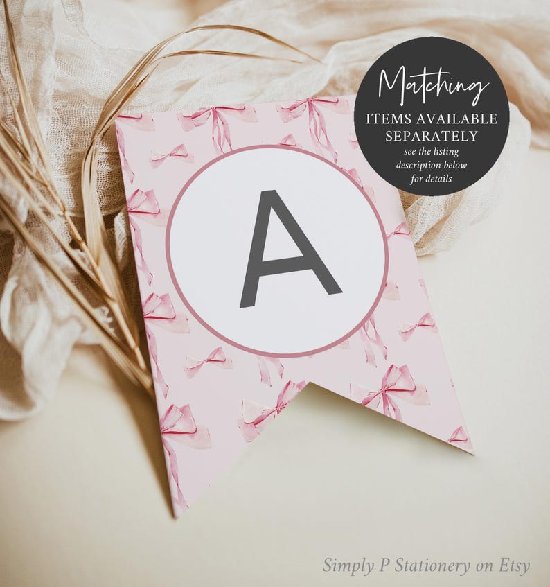 May include: A pink and white printable banner with a watercolor bow pattern. The banner has a large letter A in a circle. The text "Matching Items Available Separately" is on the banner. The text "See the listing description below for details" is on the banner. The text "Simply P Stationery on Etsy" is at the bottom of the banner.