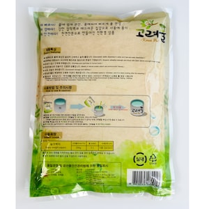 May include: A beige bag of Korea Pul wallpaper paste with a green and white design. The bag features instructions for use and product information in Korean. The bag is labeled with the text "Korea Pul" and "Made in Korea".