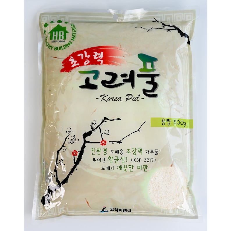 May include: A white bag of Korea Pul, a high-strength, eco-friendly wallpaper paste. The bag is labeled with the text "Korea Pul" and "500g". It also states that the paste is antibacterial and provides a clean finish.