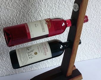 Stand for two wine bottles made of barrel staves