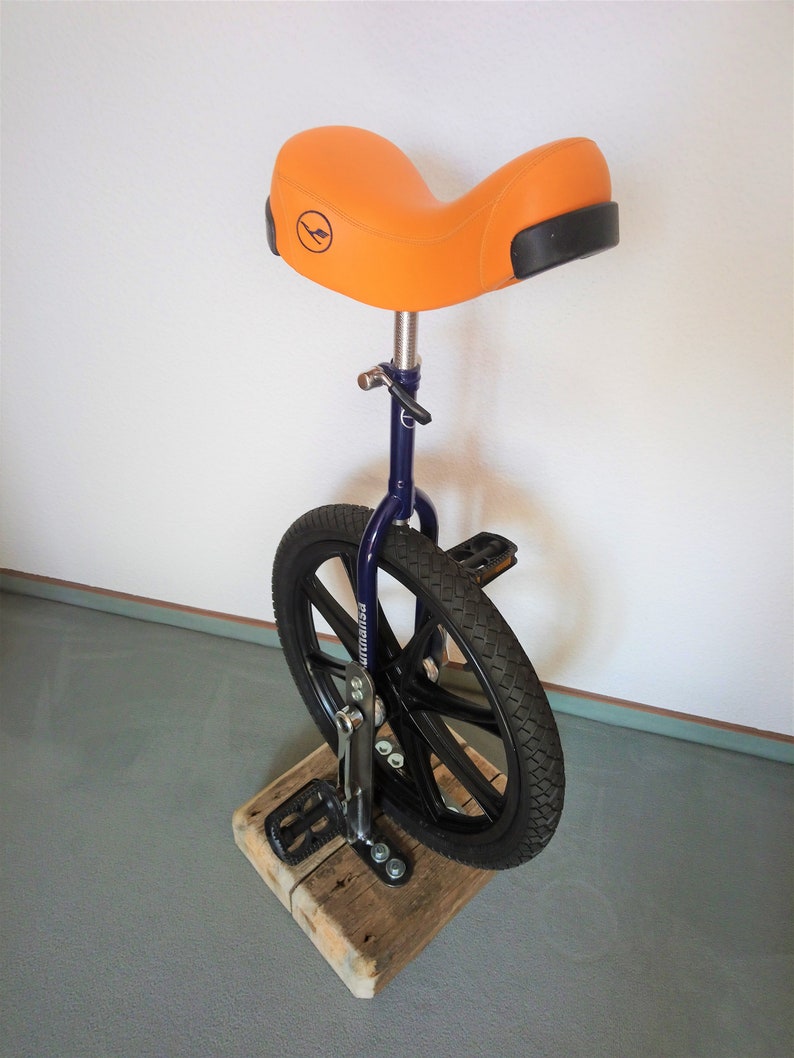 Bar stool from an bicycle and driftwood