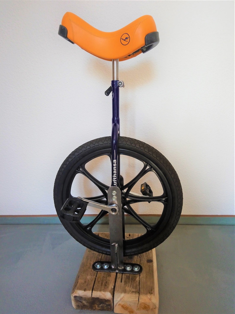Bar stool from an bicycle and driftwood
