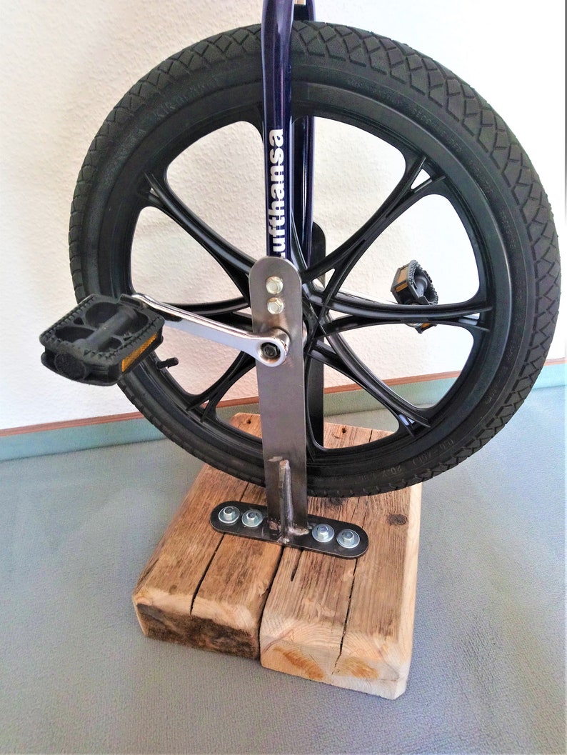 Bar stool from an bicycle and driftwood