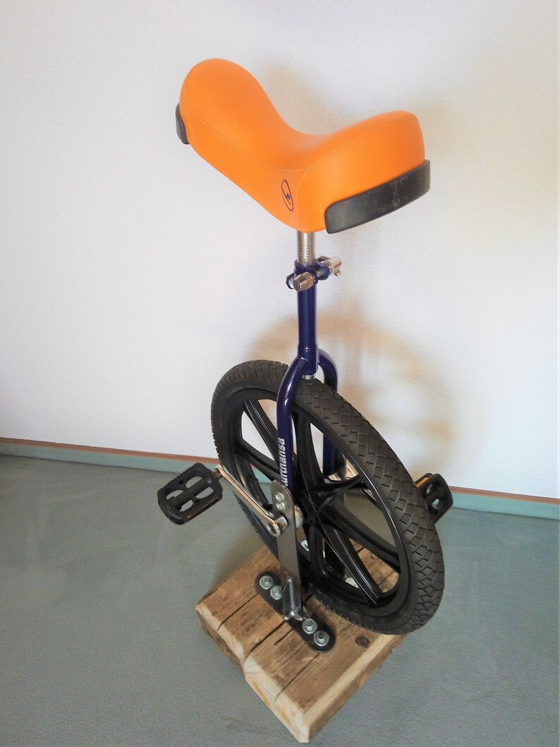 Bar stool from an bicycle and driftwood
