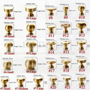 May include: A collection of brass cabinet knobs in various designs and sizes. The image displays knobs with different shapes, including round, mushroom, and cylindrical styles. Each knob is labeled with a number and size, with measurements in millimeters and inches.