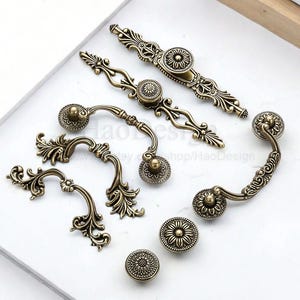 Retro europejskie uchwyty do komód, gałki do szuflad, uchwyty do ozdobnych szafek kuchennych, uchwyty do szafek na wino, zabytkowe okucia meblowe