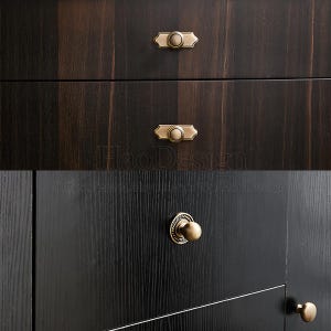 May include: Close-up of dark wood cabinet doors with antique brass hardware. The top two drawers have rectangular pulls with a circular center, while the bottom door features a round knob. The text "HaoDesign" is visible.