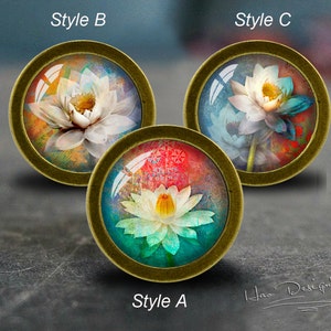 May include: Three round, decorative, gold-toned, framed images with a white lotus flower design. The images are labelled "Style A", "Style B", and "Style C".
