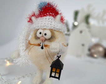 Wool felt white cat with elf cap and lantern, textile miniature cat needle felted, funny christmas decoration figurine felt cat