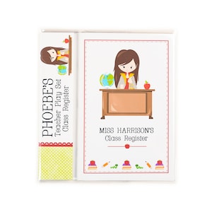 May include: A teacher play set with a class register. The register has a colourful illustration of a teacher at her desk with a globe, books, and an apple. The text on the register says "Miss Harrison's Class Register".