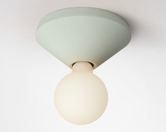 Colored ceiling lamp holder in concrete handcrafted in Italy ADA in Mint Green