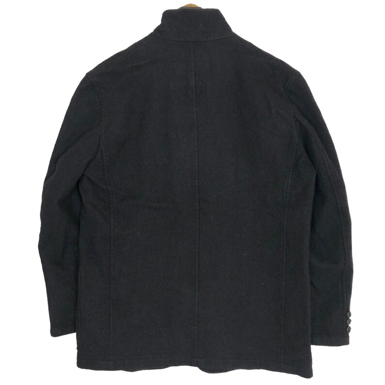 May include: A black wool blazer with a high collar and buttoned cuffs. The jacket has a tailored fit and a classic design, suitable for various occasions. The blazer is a versatile piece of outerwear.