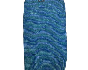 May include: A blue and white striped surfboard bag. The bag has a rectangular shape with a rounded top. The bag has a small black tag with a logo on the top. The bag has a black drawstring closure at the bottom.