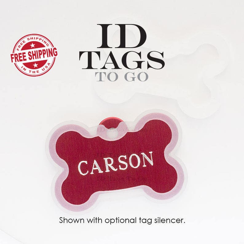 Puede incluir: Etiqueta de identificaci&oacute;n para perro de hueso rojo con el nombre "CARSON" grabado en blanco. La etiqueta se muestra con un silenciador de etiqueta opcional. Env&iacute;o gratuito.