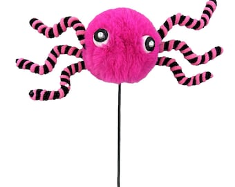 May include: A whimsical, plush pink octopus on a black stem. The octopus has large, googly eyes and black and pink striped tentacles. The toy is designed to be a decorative item or a playful accessory.