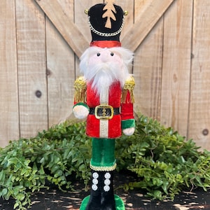 13.75 Inch, Red and Green Nutcracker Soldier, Christmas Decor, Wreath Attachment with Gold Trim and Black Hat and Boots
