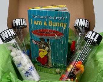 I am a Bunny board book box with sensory tubes