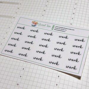 May include: A sheet of clear stickers with the word "work" written in black cursive on each sticker. The stickers are arranged in rows and columns on a white background. The text "Sweet Tea Stickers Co." is printed in the top right corner of the sheet.