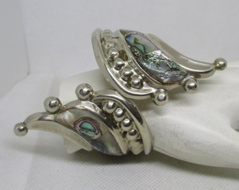 Pulsera tipo brazalete vintage mexicana de plata con diseño de alpaca en espiral: diseño de cierre de abulón.