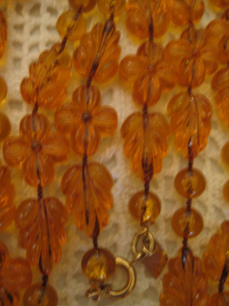 AMBER SARAH COVENTRY Necklaces Clear Amber Lucite Leaves Flower Round Beaded Necklace Gold Tone Clasp Tag Signed Sarah Coventy Vintage 1970s