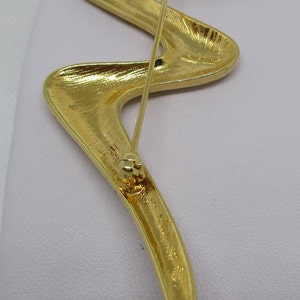 Broche Claude Montana Doré en Métal - 41788297 Broche Claude Montana Doré en Métal - 41788297