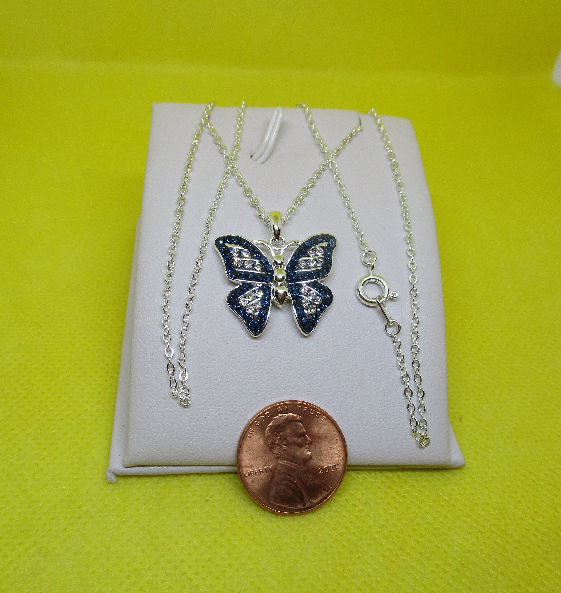 Zales Outlet 1/8 CT. T.W. Diamond Double Butterfly Necklace in Sterling  Silver | Hamilton Place