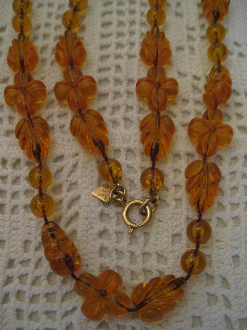 AMBER SARAH COVENTRY Necklaces Clear Amber Lucite Leaves Flower Round Beaded Necklace Gold Tone Clasp Tag Signed Sarah Coventy Vintage 1970s
