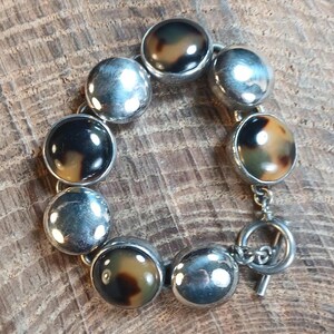 Sterling Silver Shiva's Eye Operculum Mollusks  Foot Bracelet 7.75"