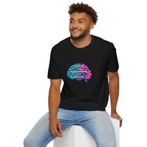 May include: A black t-shirt with a graphic of a brain with the text "Powered by Hyperfocusing and Insomnia".