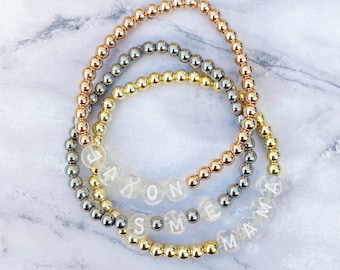 White Letter Beaded Bracelets