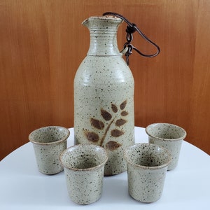 Hand Thrown Ceramic Wine Jug with Cork Stopper with Four Matching Cups - Guy de Pelteau, Quebec, Signed