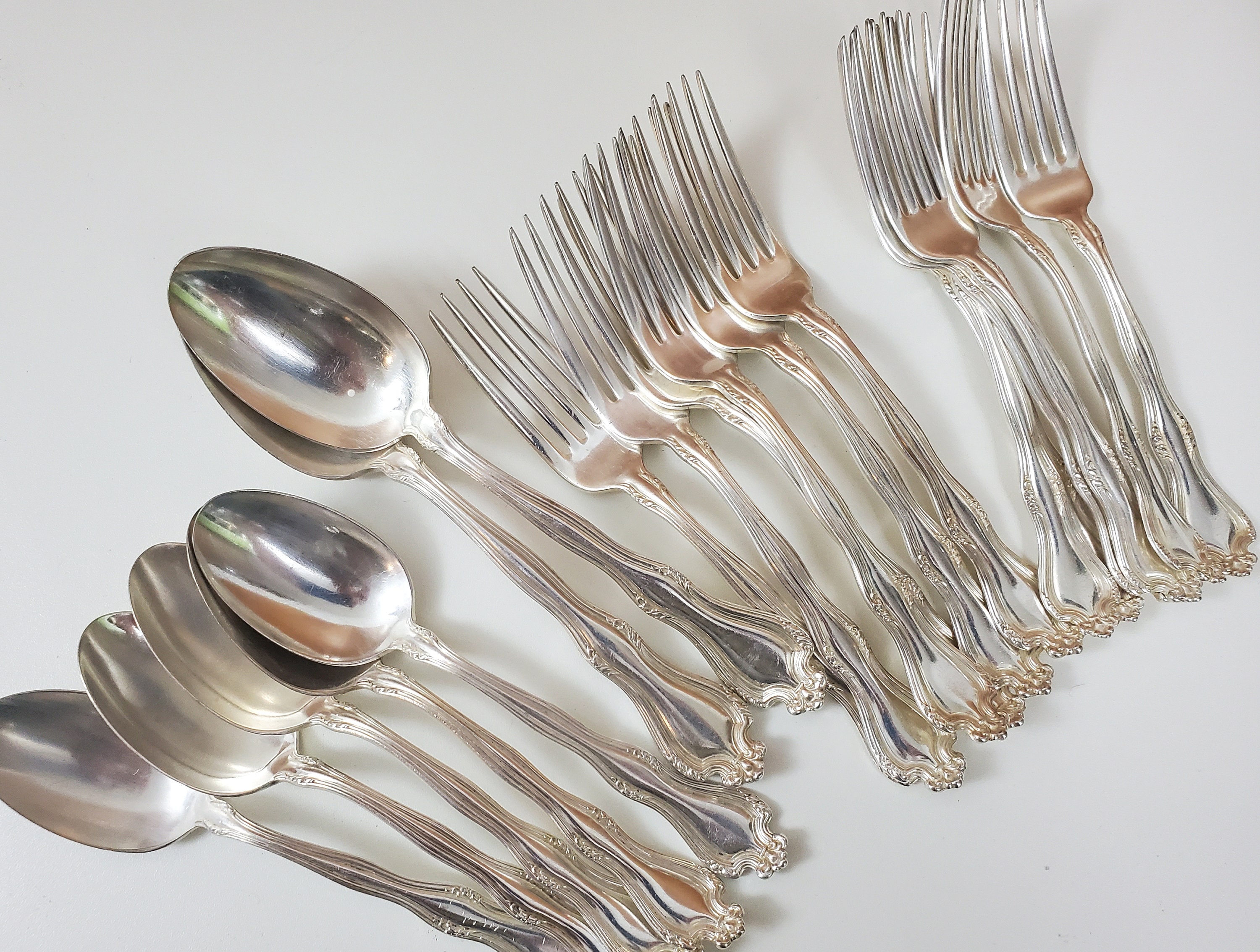 Faneuil five-piece flatware set in sterling silver.