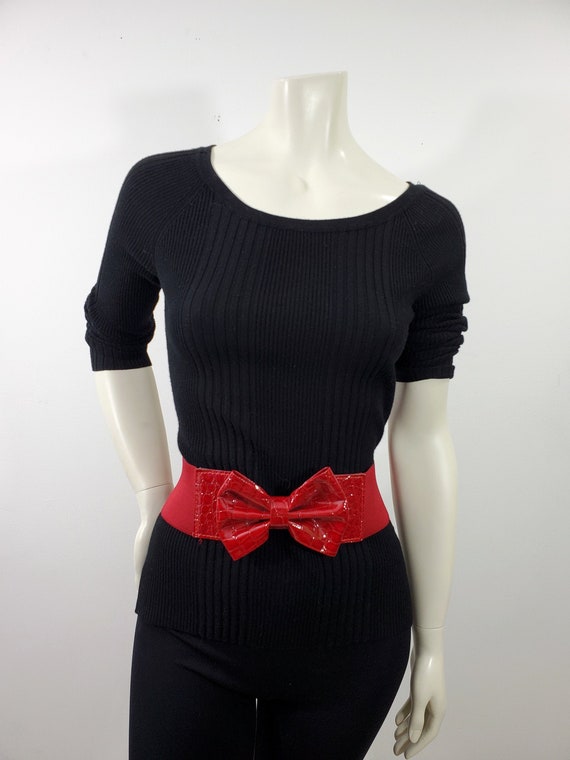 Vintage 1980s New Look Red Elastic and Leatherette Woman display picture 1