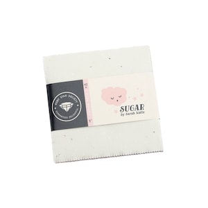 May include: A white fabric square with a pink cloud and stars design. The fabric square is part of a 42 piece fabric collection called "Sugar" by Sarah Watts. The fabric square is 5 inches by 5 inches.