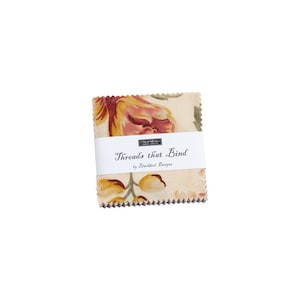 May include: A pack of fabric squares with a floral print in shades of red, yellow, and green. The fabric is labeled "Threads that Bind by Blackbird Designs".
