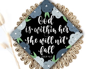 May include: Black graduation cap with a floral design in shades of blue and green. The text "God is within her, she will not fall, Psalm 46:5" is written in white.