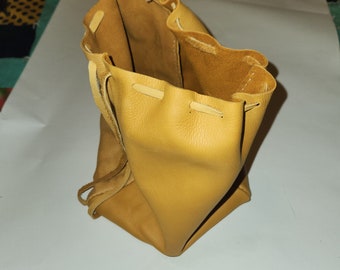 large 3-sided deer hide bag, several different colors