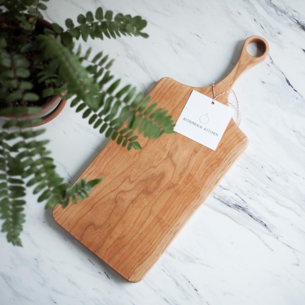 Classic Cherry Wood Cutting Board with Handle, Wood Serving Board, Paddle Board | Single Piece - No Glue - Organic Finish