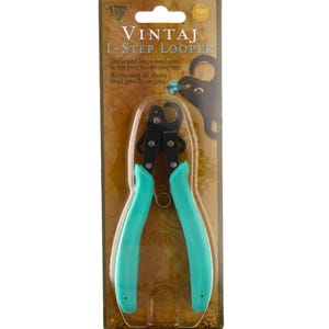 May include: A Vintaj 1-Step Looper jewellery tool with bright teal handles and black metal jaws, packaged on a brown cardboard backing card. The packaging features the text Vintaj 1-Step Looper and describes the tool as trimming and looping head pins.
