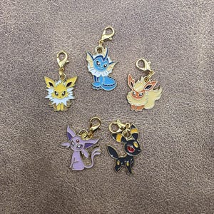Eeveelutions Badge Reel Charm, Charm for lanyard, zipper, backpack, or keyring