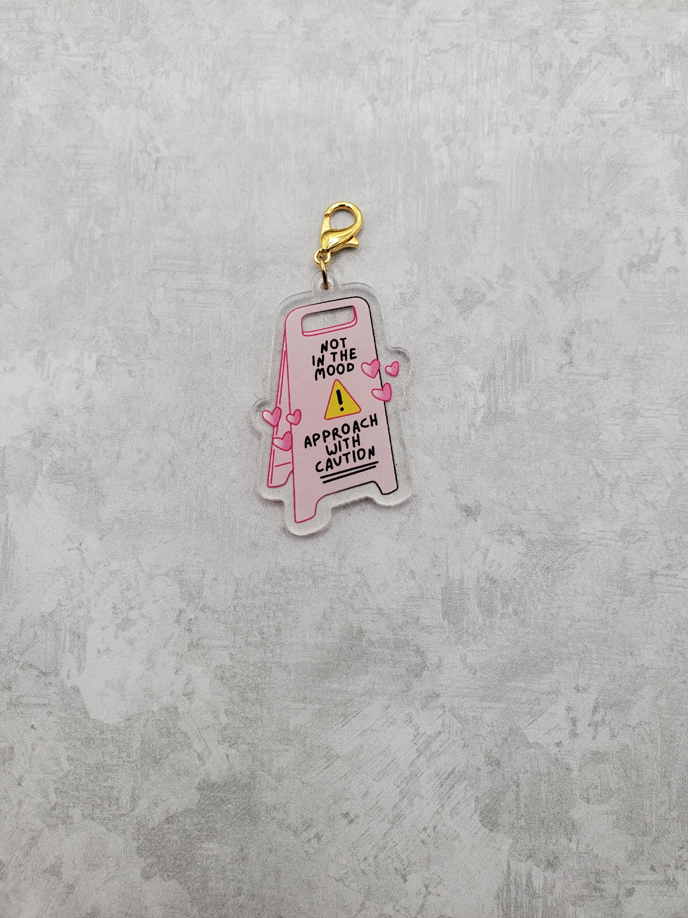 Approach with Caution Badge Reel Charm, Charm for backpack, lanyard, zipper,or keyring